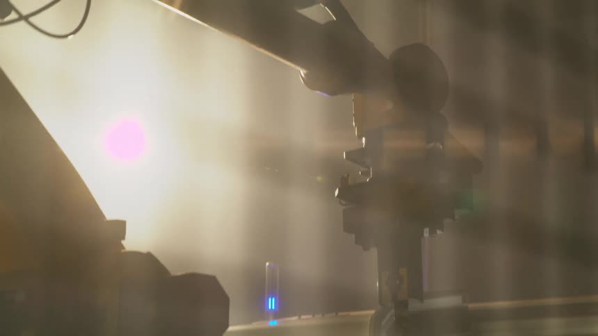 Robotic machine in operation in a factory