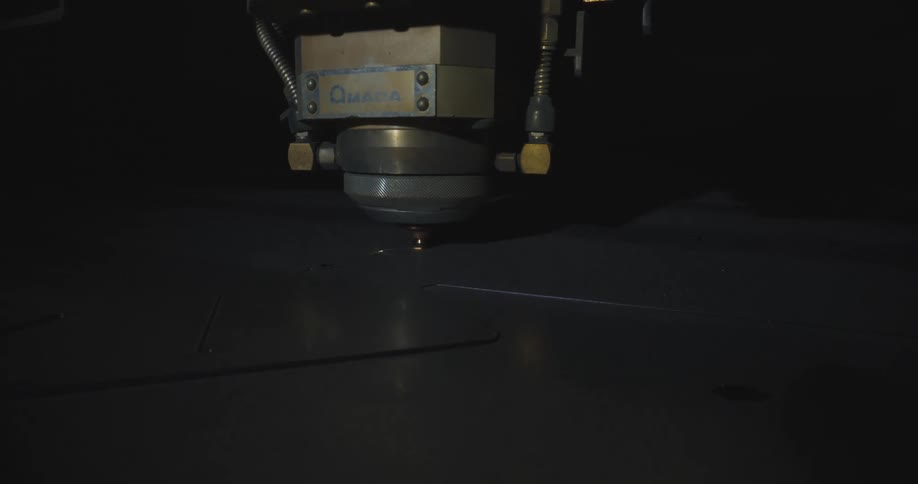 A machining tool is cutting metal