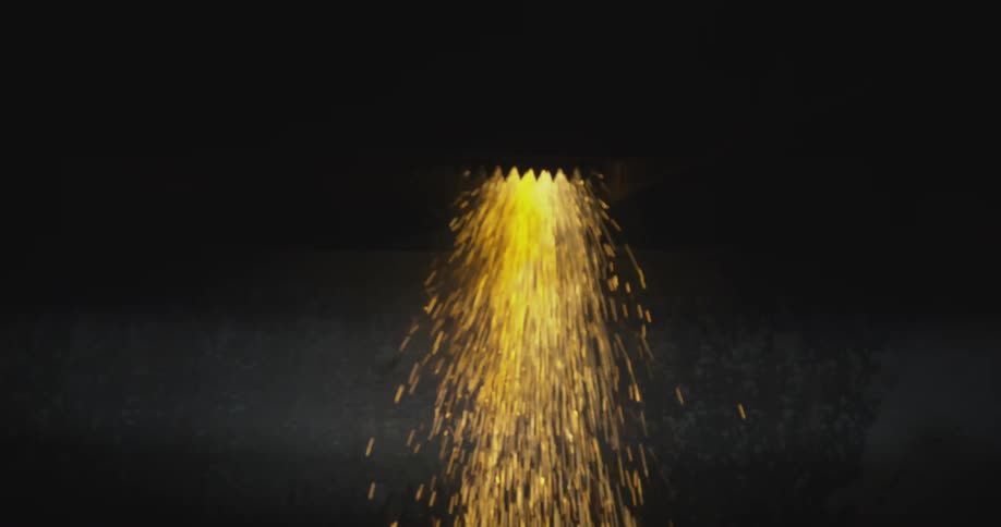 Golden sparks falling through a hole