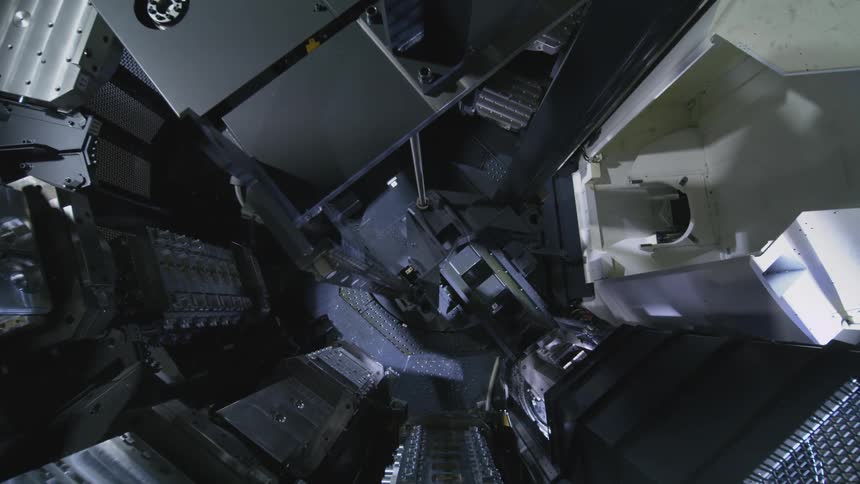 Interior view of a robotic factory in operation