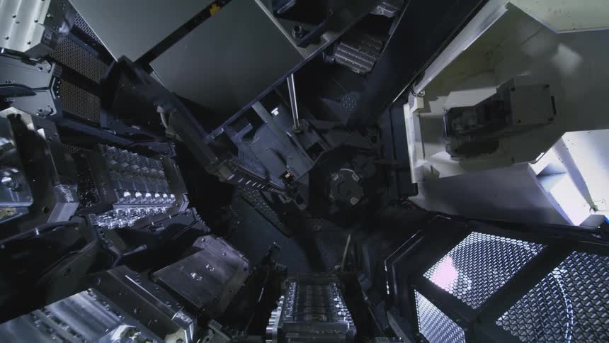 Robotic parts in the machine move things around
