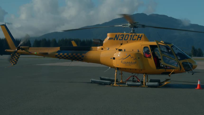 The helicopter is running on the runway