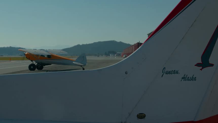 The plane turns on the runway