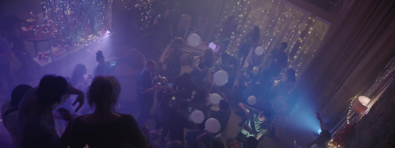 People are partying with lights flashing all over