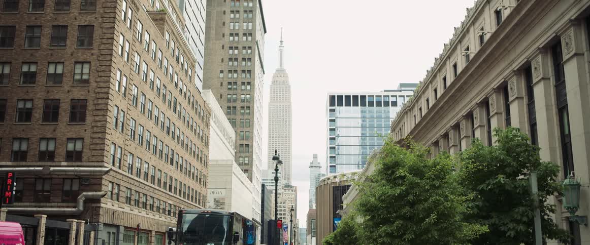 City street view with the empire state building in the background