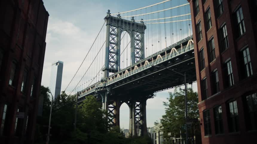 Past the apartment buildings is the manhattan bridge