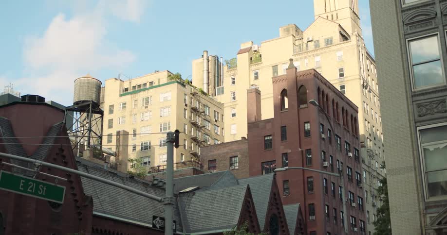 Buildings painted in different colors in a city at midday