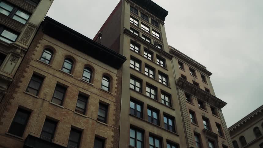 Urban buildings in a city on a cloudy day