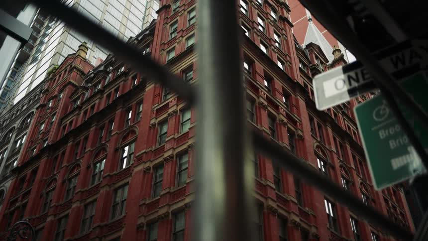 Upward view of classical buildings in an urban city