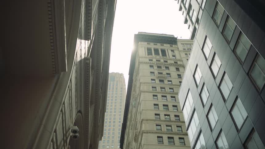 Upward view of an urban road with buildings
