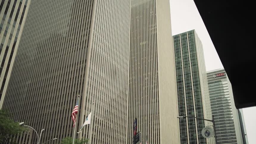 Upward view of modern commercial skyscrapers in a metropolis
