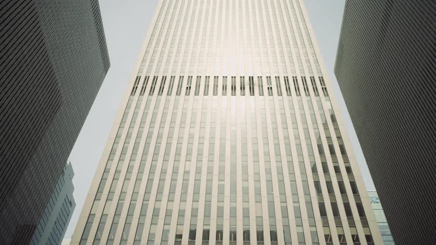Multiple condos stand tall in the middle of a downtown city