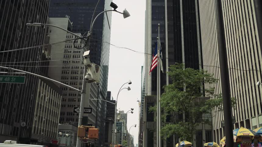 Street of a metropolis with modern buildings seen during the day