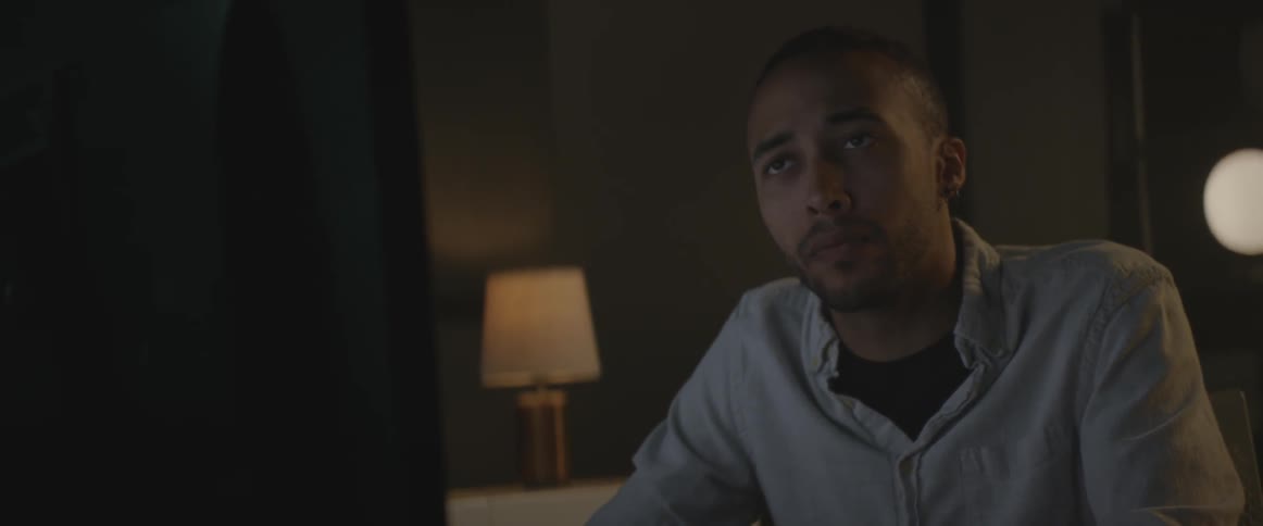 A man works at a computer