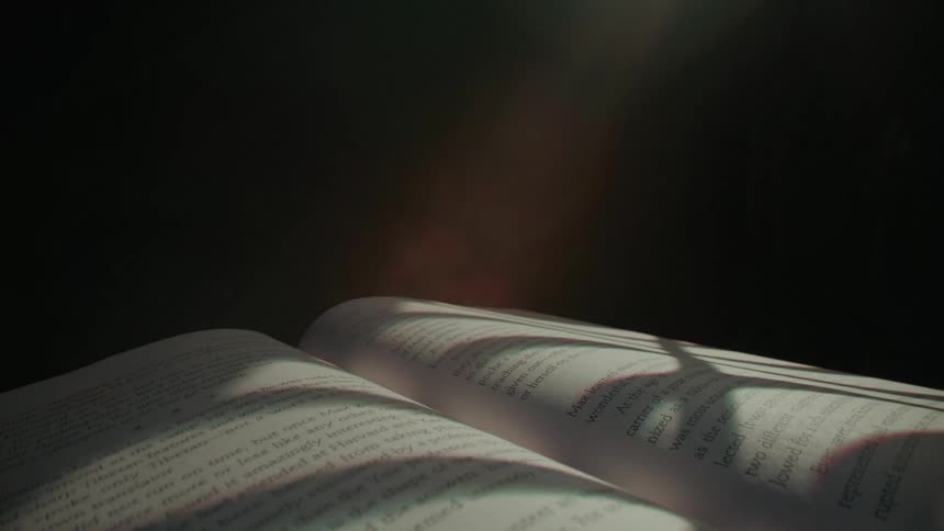 The light passes by the book
