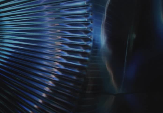 Abstract reflection of lights on a metal surface
