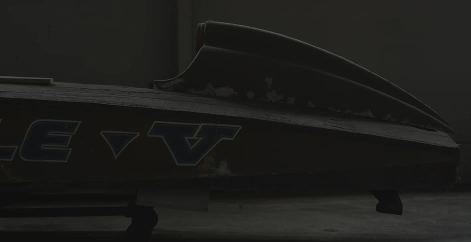 A boat in a dim room