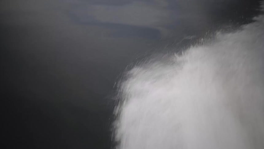 Water moving by the force of a boat