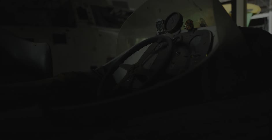 A car in a dark room
