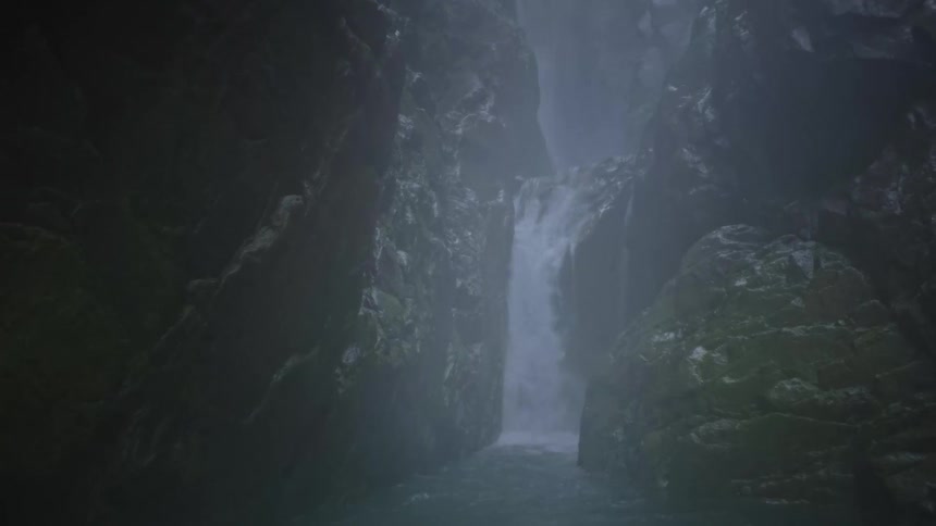 Moving through the water of a dark misty canyon the camera approaches a waterfall and slowly pans up its rocky face