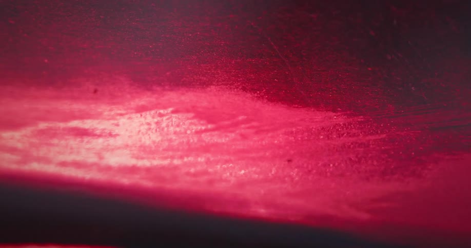 Red light flashing on a surface