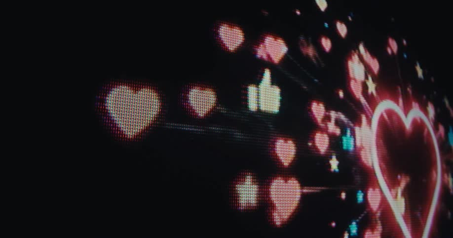 Animation of a heart exploding into different symbols is on the screen