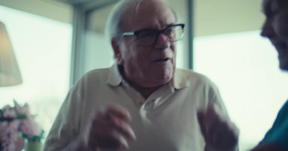 Elderly couple elderly couple in an indoor environment talking happily