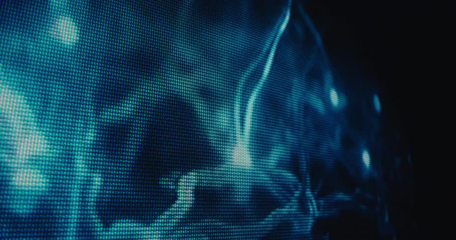 Glowing blue digital patterns flow across a pixelated screen