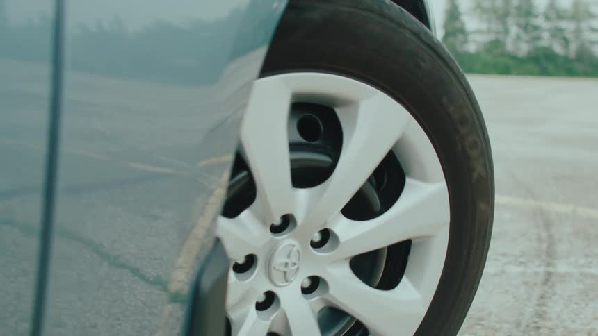 Closeup of the front wheel of a vehicle reversing