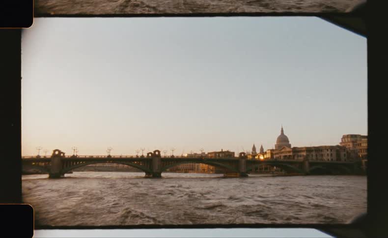 Traces of a boat moving through a sea canal in a classical city