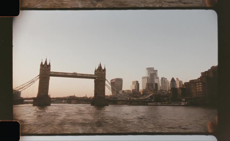 A large bridge is over the river in the city