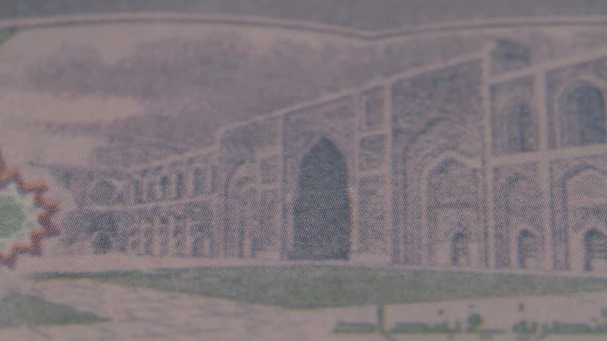 The iraqi dinar banknote features intricate security elements and national symbols