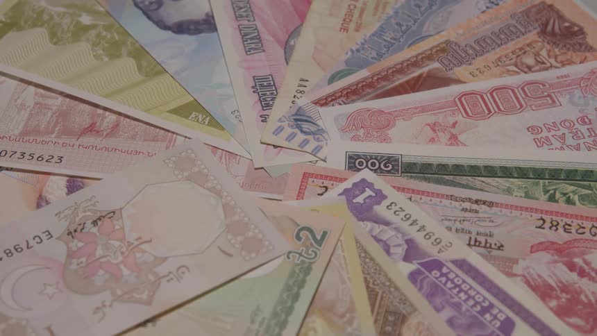 Different forms of currency are in a circle