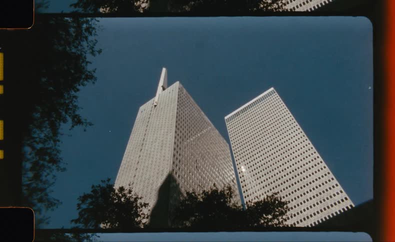 A high rise office building in a metropolitan area during daytime