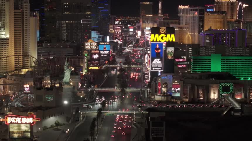 Brightly lit Las Vegas strip at night aerial view