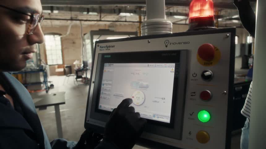 An employee is navigating on an electronic system