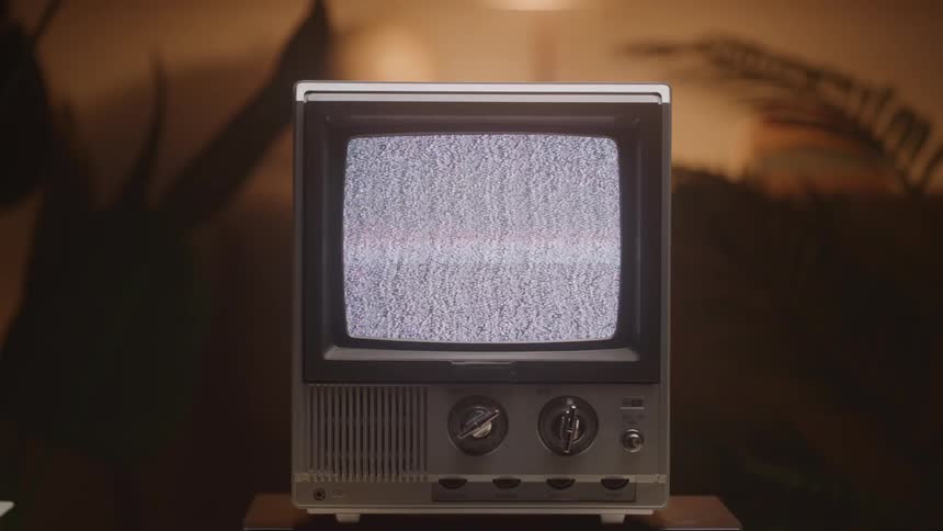 An old television with static on the screen