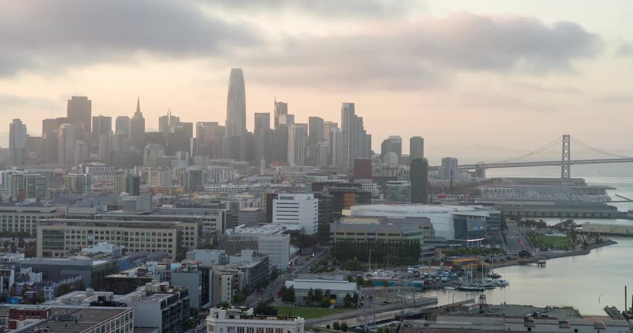 Aerial panorama of a metropolis with bridges and skyscrapers by the sea