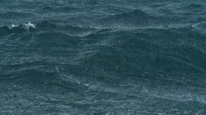 Rain falling on a heavy sea