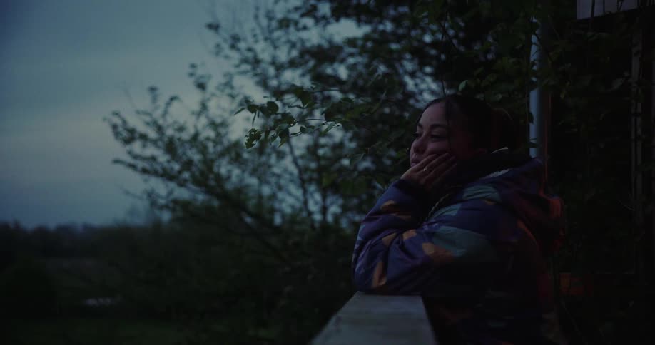Thoughtful woman in an outdoor setting one morning