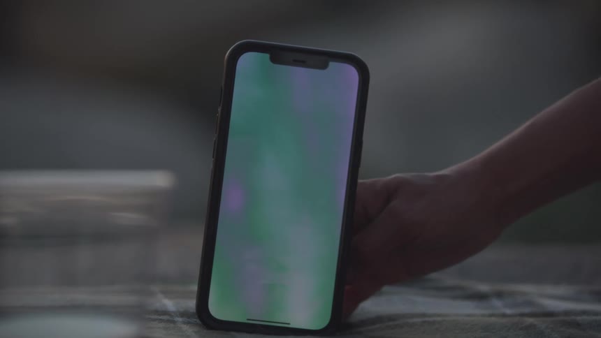 Hand holding a smartphone