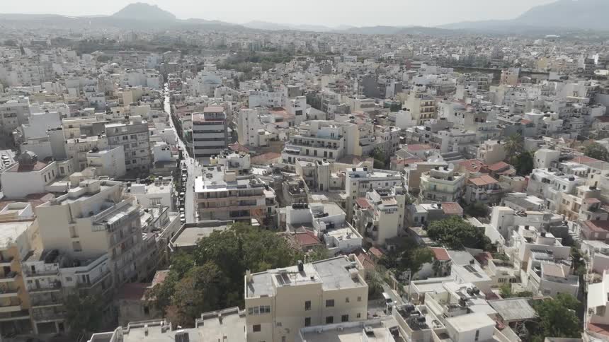 Panorama of an urban city with mountains on the horizon