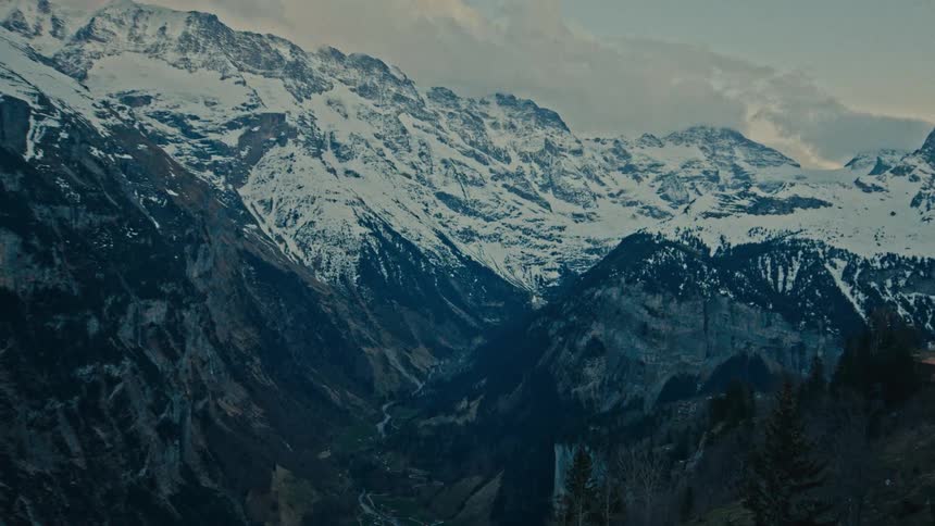 The vast mountain range is covered with snow