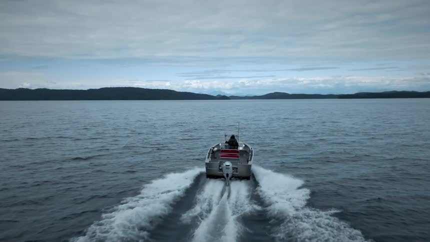 The boat is heading towards the shore