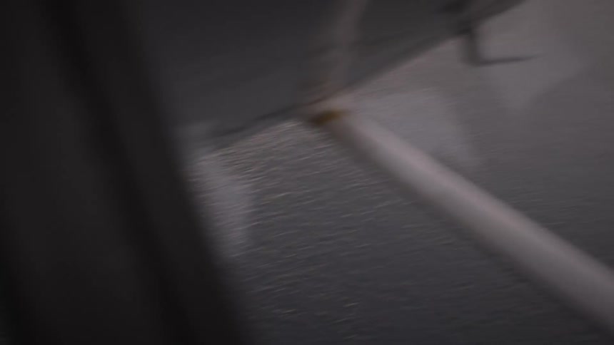 The plane flies over the shore line