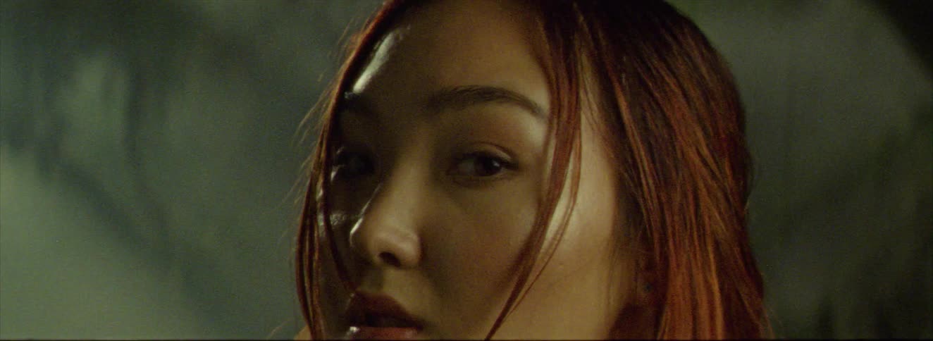 A woman spins her head to look back