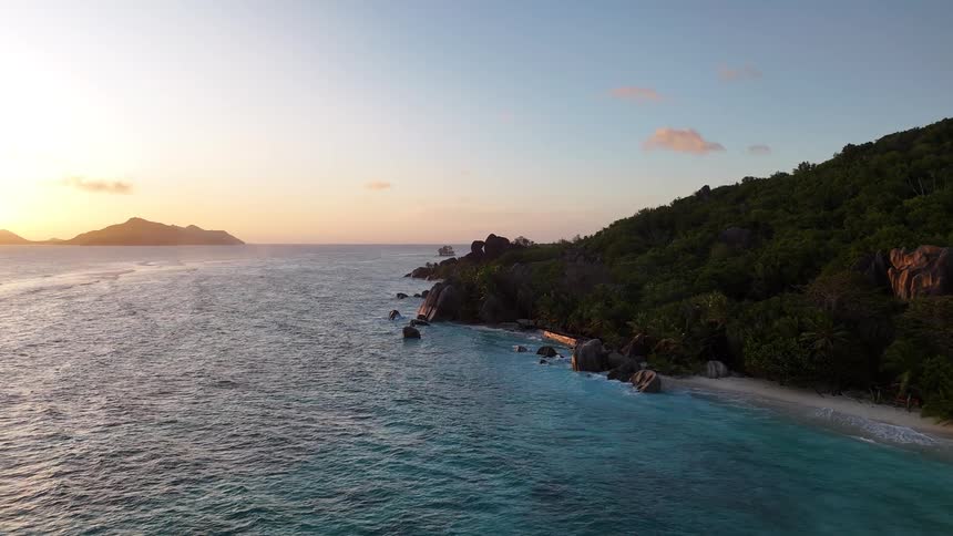 The sun is rising on the island
