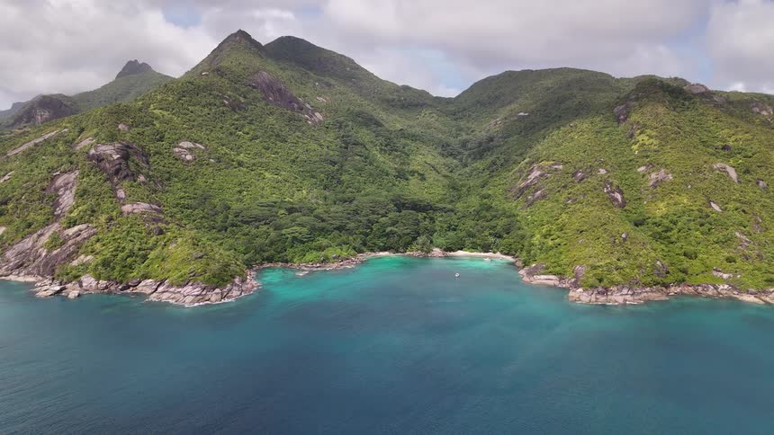 Forested mountain range by the sea on a peninsula