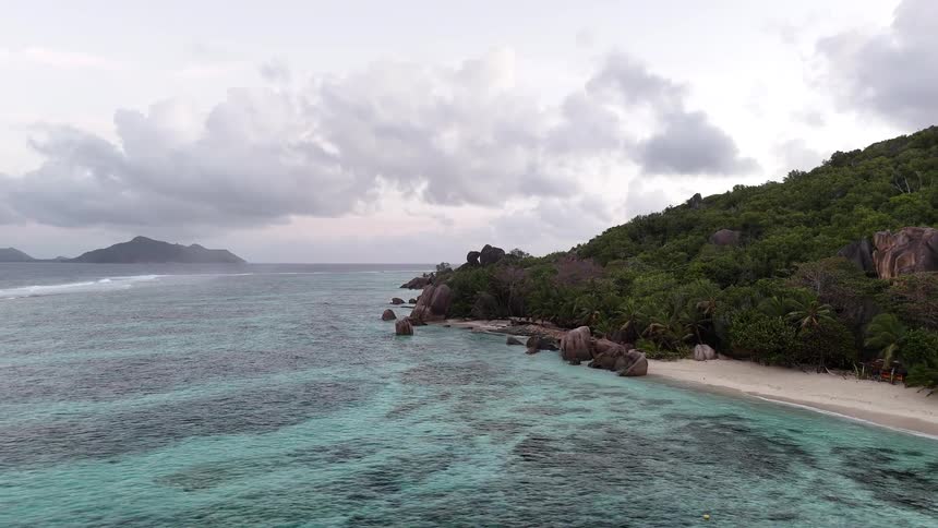 The water is shallow around the island