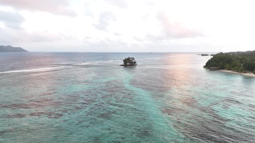 Landscape of a small isolated island in an archipelago on a cloudy morning